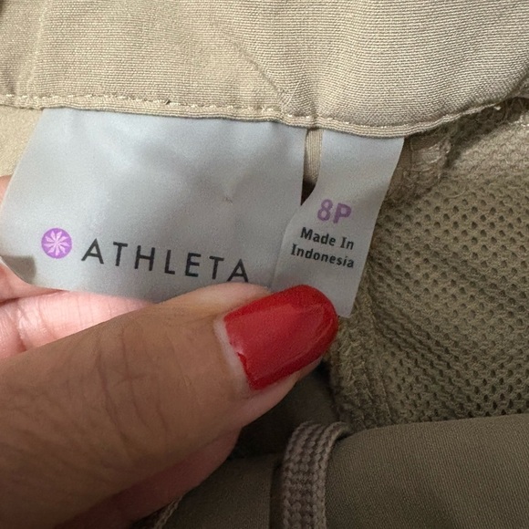 Woman’s Athleta Nylon Tan Cargo Pants. 
Zipper, snap waist and drawstring. - Picture 12 of 16